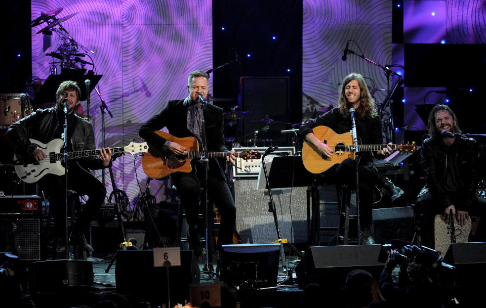 From left, musicians Ben McKee, Dan Reynolds, Daniel Platzman and Wayne Sermon of Imagine Dragons perform onstage at The 56th Annual GRAMMY Awards Salute to Industry Icons with Clive Davis, on Saturday, Jan. 25, 2014 at the Beverly Hilton Hotel in Beverly Hills, Calif. (Photo by Frank Micelotta/Invision/AP)
