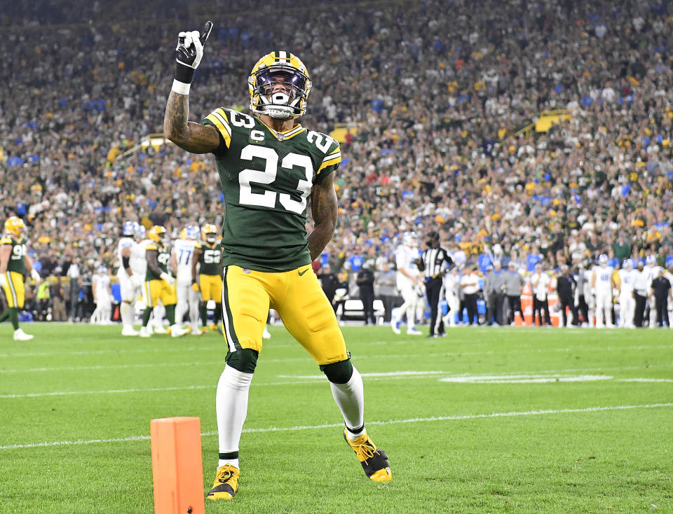 GREEN BAY, WISCONSIN - SEPTEMBER 20: Jaire Alexander #23 of the Green Bay Packers reacts after breaking up a pass against Amon-Ra St. Brown #14 of the Detroit Lions during the first half at Lambeau Field on September 20, 2021 in Green Bay, Wisconsin. (Photo by Quinn Harris/Getty Images)