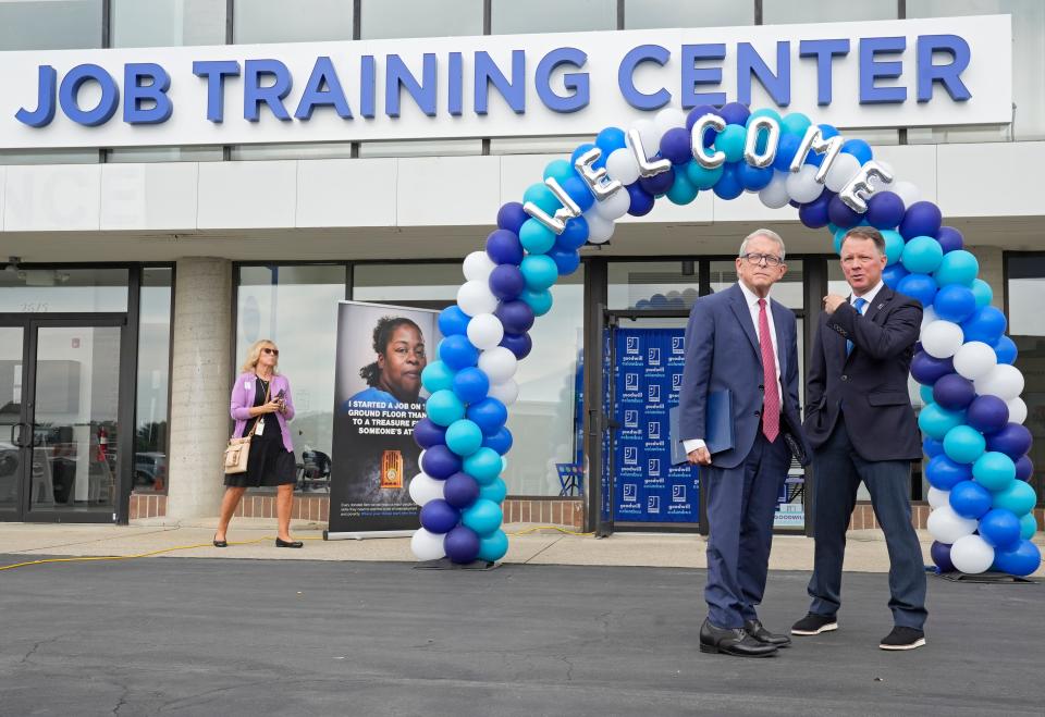 Sept. 7, 2023; Columbus, Oh., USA; 
Ohio Governor Mike DeWine and Goodwill Columbus CEO Ryan Burgess talk before a opening ceremony for Goodwill Columbus' third and largest job training center at the Bryce Road location on the East Side of Columbus. In partnership with the Governor's Office of Workforce Transformation Broadband and 5G Sector Workforce Strategy, the center will offer free training for the broadband workforce.