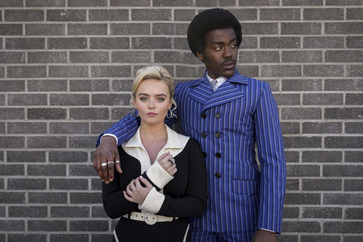 Ncuti Gatwa and Millie Gibson pose in front of a brick wall in a scene from Doctor Who