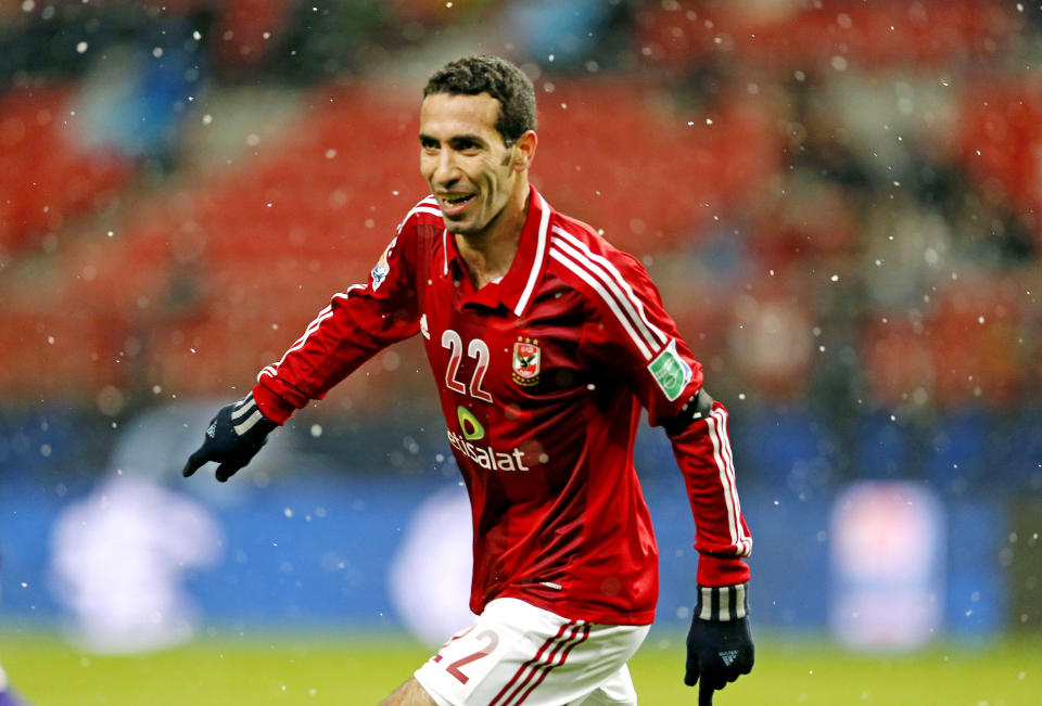 FILE - In this Dec. 9, 2012 file photo, Al-Ahly SC's Mohamed Aboutrika celebrates after scoring a goal against Sanfrecce Hiroshima during their quarterfinal at the FIFA Club World Cup soccer tournament in Toyota, Japan. On Monday, Nov. 12, 2018, an Egyptian court sentenced Aboutrika, one of the country's greatest all-time soccer players, to a year in prison for tax evasion while also giving him the option to pay a fine of 20,000 Egyptian pounds, or $1,115, to have the sentence suspended. (AP Photo/Shuji Kajiyama, File)