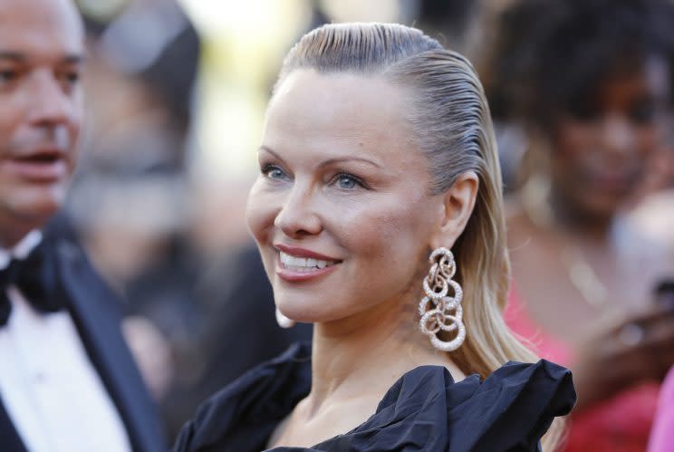 Unrecognisable… Baywatch star Pamela Anderson pitches up in Cannes – Credit: Getty