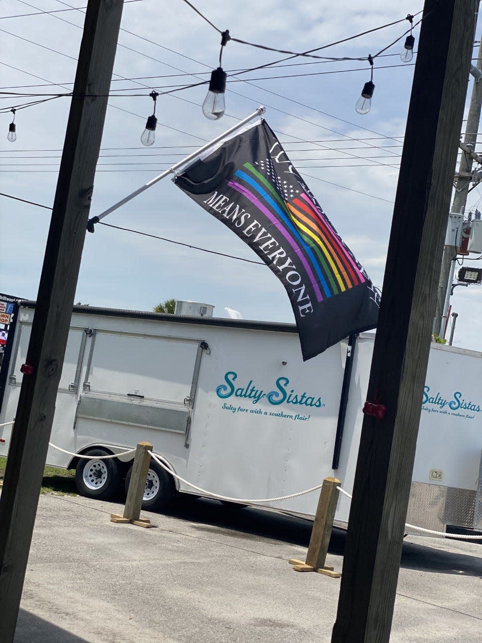 Jeanette Georgitis flies her all-encompassing pride flag proudly in spite of the vandalism her truck has been subjected to.