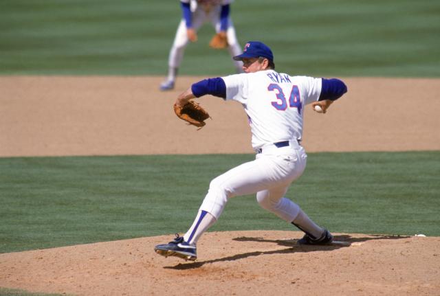 Pitcher Nolan Ryan of the California Angels watches the field from