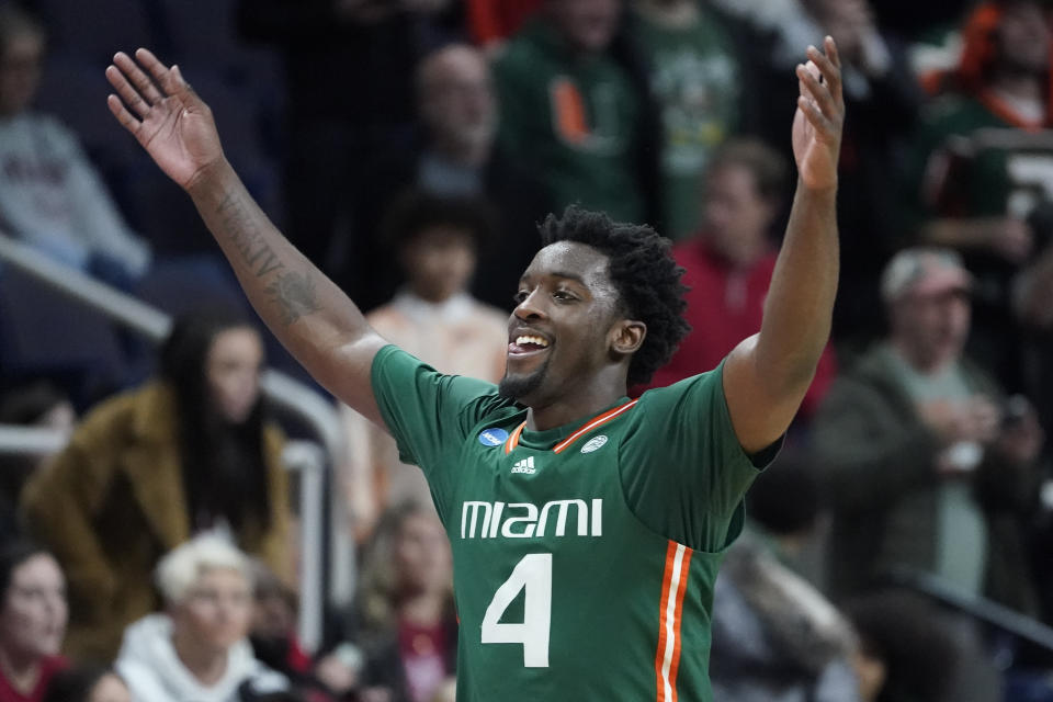 Miami's Bensley Joseph (4) reacts after winning their second-round college basketball game against Indiana in the NCAA Tournament, Sunday, March 19, 2023, in Albany, N.Y. (AP Photo/John Minchillo)