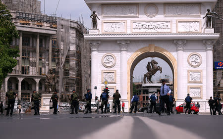 FILE PHOTO: Macedonian police stand guard near the parliament building in Skopje, Macedonia, April 28, 2017. REUTERS/Stoyan Nenov