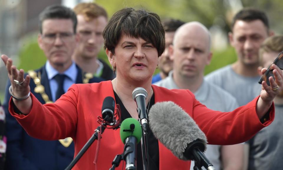 Arlene Foster, leader of the DUP, speaks to the gathered mourners at the Creggan estate.