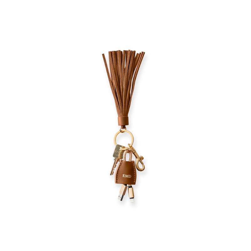 <p><a href="https://go.redirectingat.com?id=74968X1596630&url=https%3A%2F%2Fwww.markandgraham.com%2Fproducts%2Fpersonalized-power-up-tassel-keychain%2F&sref=https%3A%2F%2Fwww.countryliving.com%2Fshopping%2Fgifts%2Fg4835%2Fbirthday-gifts-for-mom%2F" rel="nofollow noopener" target="_blank" data-ylk="slk:Shop Now;elm:context_link;itc:0;sec:content-canvas" class="link rapid-noclick-resp">Shop Now</a></p><p>Power Up Lightning to USB Tassel Keychain</p><p>markandgraham.com</p><p>$34.99</p>