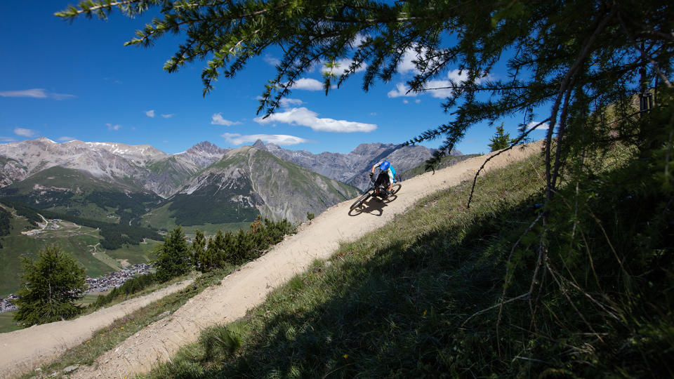  A rider on a trail in the Italian Alps 