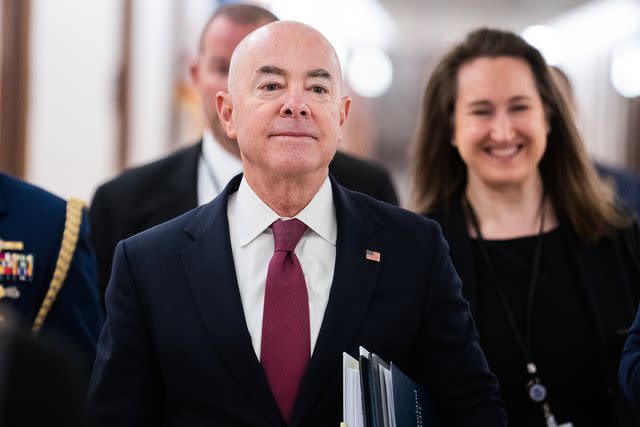<p>Tom Williams/CQ-Roll Call, Inc via Getty</p> DHS Secretary Alejandro Mayorkas arrives to testify during a Senate hearing on Oct. 31, 2023