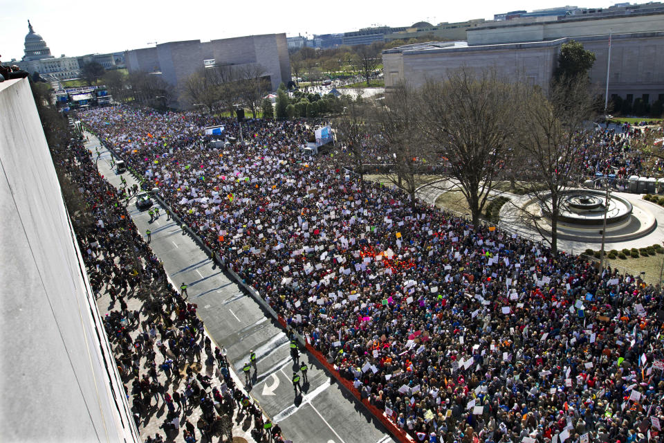 FILE - In this March 24, 2018 file photo, protesters fill Pennsylvania Avenue, as seen from the Newseum, during the March for Our Lives rally in support of gun control in Washington. March For Our Lives and the Giffords group, two prominent gun safety organizations say they'll host a forum for Democratic presidential candidates in Las Vegas on Oct. 2, 2019, the day after the second anniversary of the Las Vegas mass shooting. The organizations told The Associated Press that the forum focused on gun violence is the first of its kind for presidential hopefuls. (AP Photo/Jose Luis Magana, File)