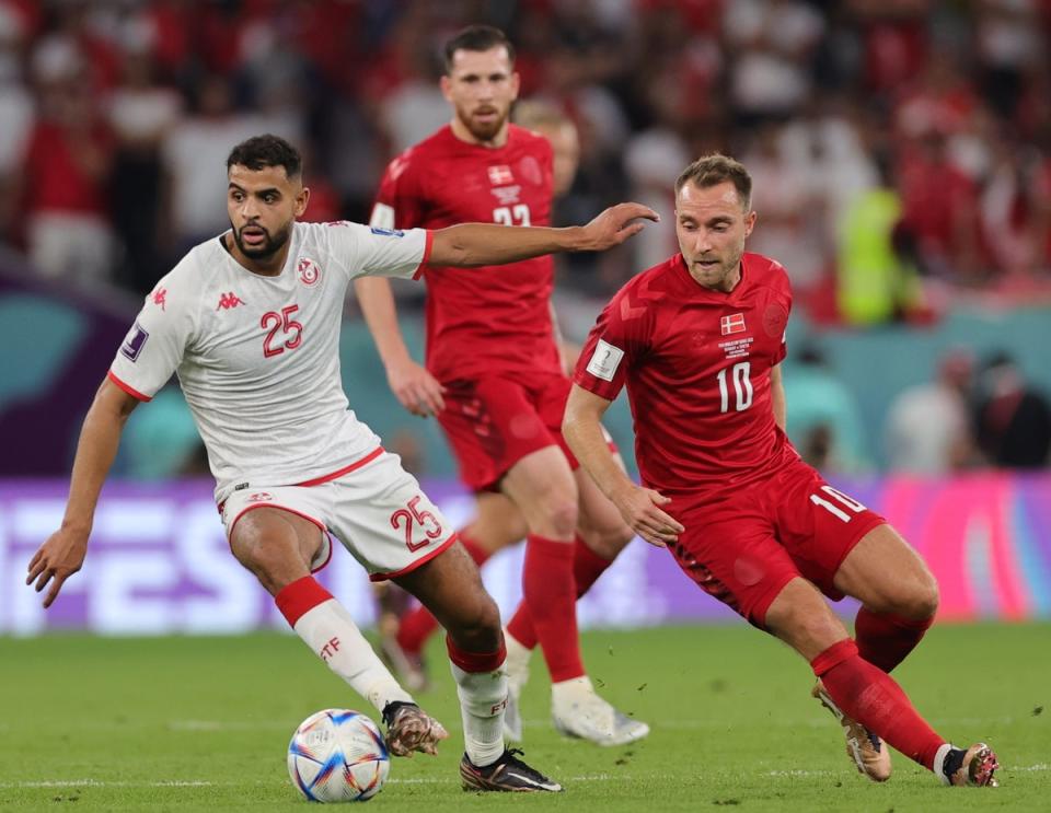 Christian Eriksen in action against Ben Slimane Anis (EPA)