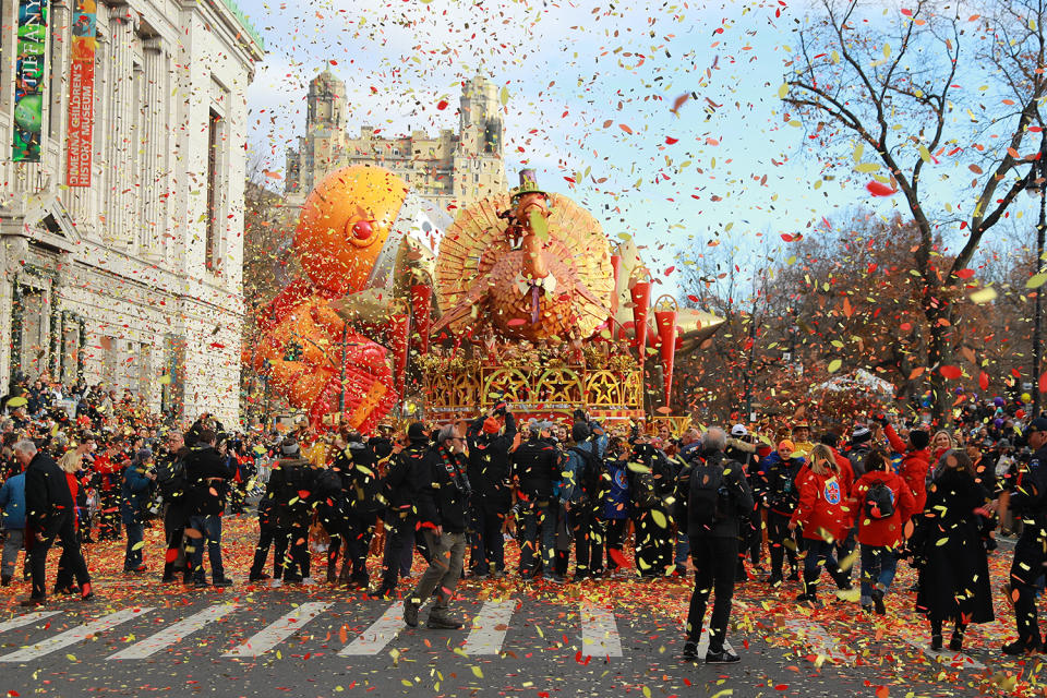 Colorful confetti is shot in the air  from the Tom Turkey float at the start of the 93rd Macy's Thanksgiving Day Parade in New York City. (Photo: Gordon Donovan/Yahoo News) 