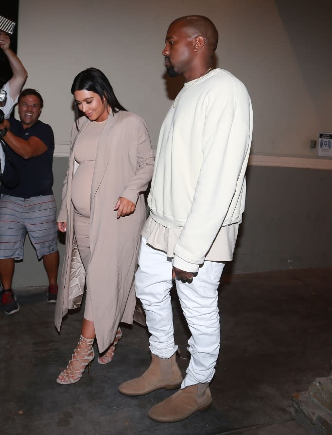 Kim Kardashian and Kanye West leaving her 35th birthday party in Los Angeles. - Credit: Splash News