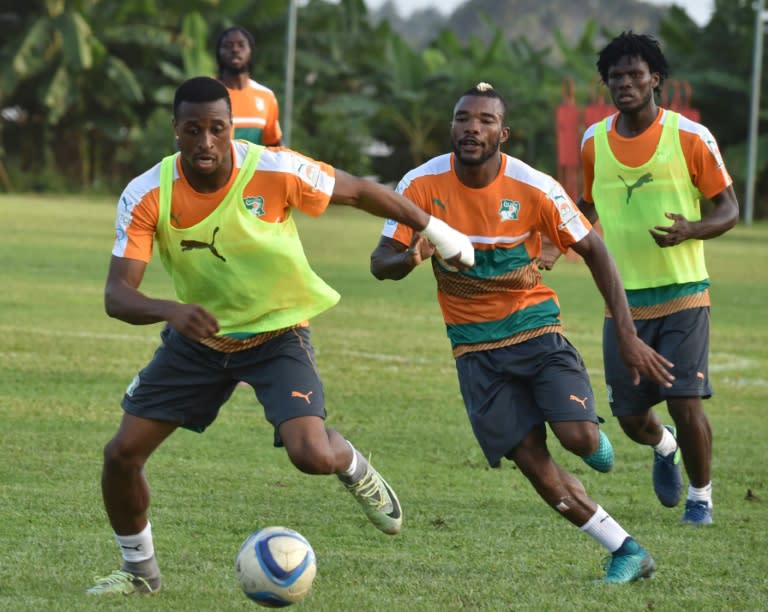 Ivory Coast's international striker Jonathan Kodjia (left) scored for Aston Villa from a penalty