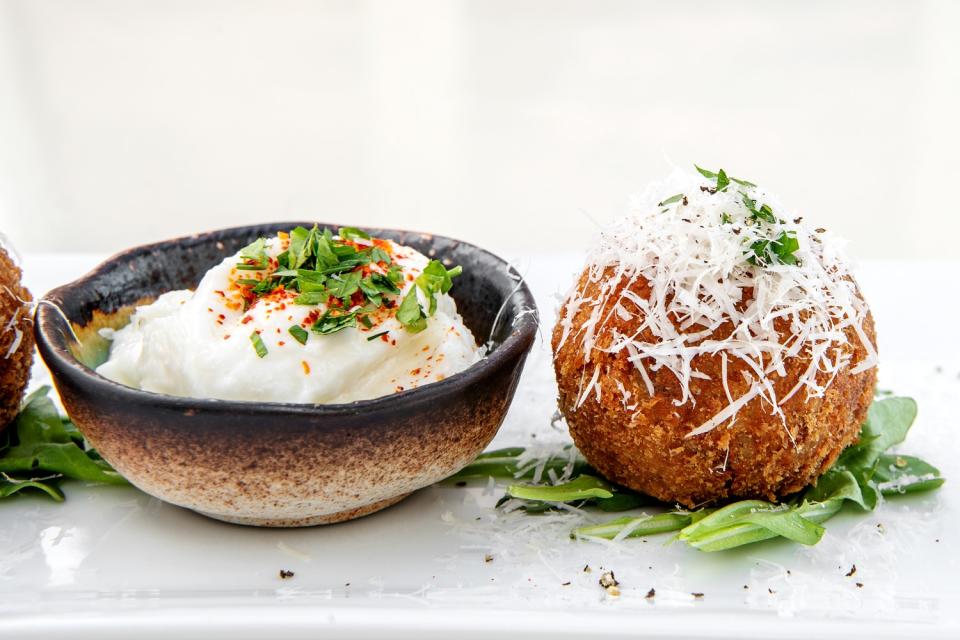 Cacio e pepe arancini from Heroic Italian.