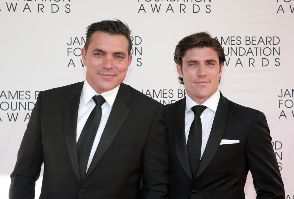 Restauranteur Todd English, left, with his son Oliver English, arrives at the James Beard Foundation Awards Gala on Monday, May 6, 2013, in New York. (Photo by Andy Kropa/Invision/AP)