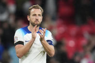 England's Harry Kane applauds at the end of the Euro 2024 group C qualifying soccer match between England and Malta at Wembley stadium in London, Friday, Nov. 17, 2023. (AP Photo/Kirsty Wigglesworth)