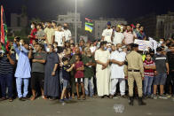 Hundreds of demonstrators protest in Tripoli, Libya, on Friday, Sept. 24, 2021, in opposition to the country’s parliament passing a vote of no-confidence in the transitional government. The motion, passed on Tuesday, represents a challenge to planned December elections and impedes efforts to unite the oil-rich North African nation after a decade of turmoil. (AP Photo/Yousef Murad)