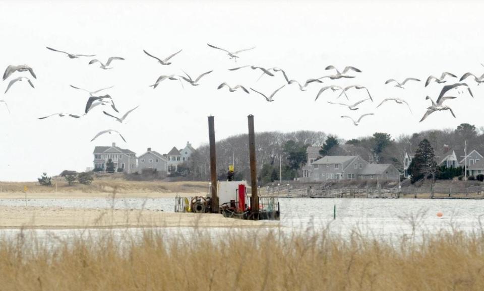 A Barnstable County dredge at the Popponesset Channel in Mashpee in 2021.