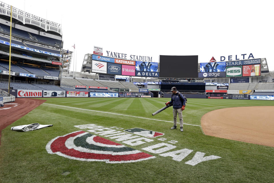 A member of the grounds crew prepares the field before the New York Yankees baseball workout on Thursday, April 7, 2022, in New York. The Yankees will face the Boston Red Sox on Friday. (AP Photo/Adam Hunger)