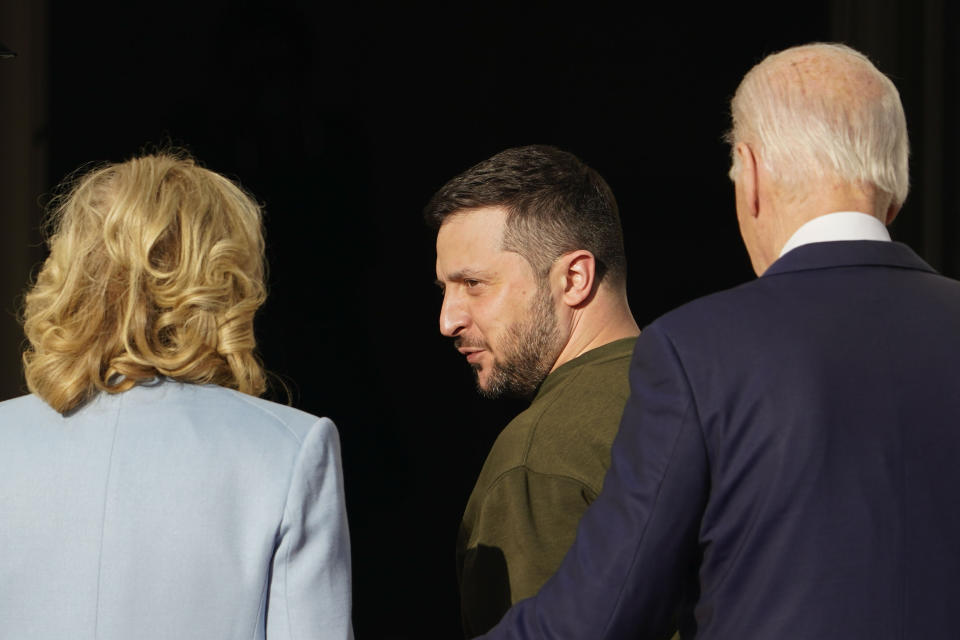 President Joe Biden, right, and first lady Jill Biden, left, welcome Ukraine's President Volodymyr Zelenskyy, center, at the White House in Washington, Wednesday, Dec. 21, 2022. (AP Photo/Andrew Harnik)