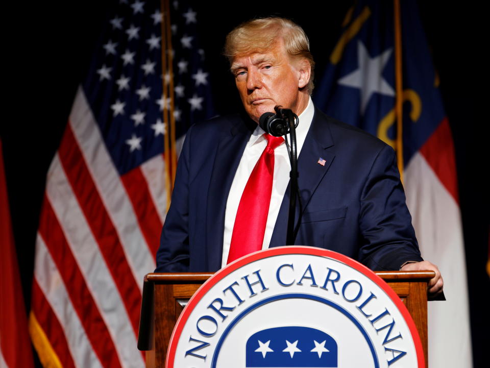 FILE PHOTO: Former U.S. President Donald Trump pauses while speaking at the North Carolina GOP convention dinner in Greenville