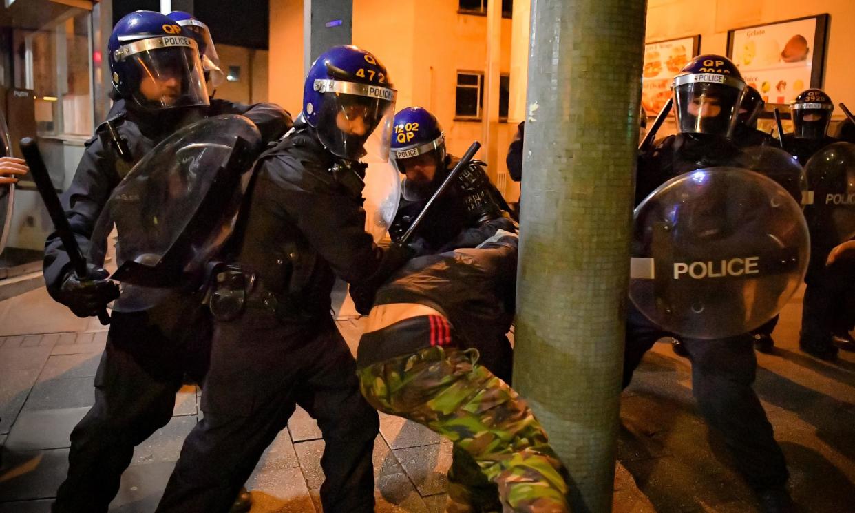 <span>Police officers detaining a man during the ‘kill the bill’ protest in Bristol on 26 March 2021. </span><span>Photograph: Ben Birchall/PA</span>