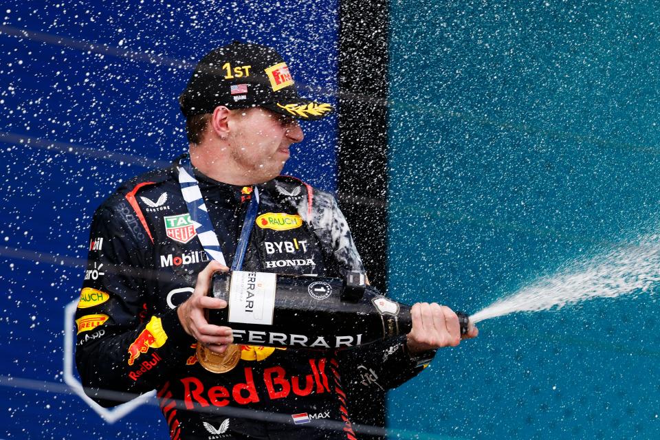 Race winner Max Verstappen of the Netherlands and Oracle Red Bull Racing celebrates on the podium during the F1 Grand Prix of Miami at Miami International Autodrome on May 07, 2023 in Miami, Florida.