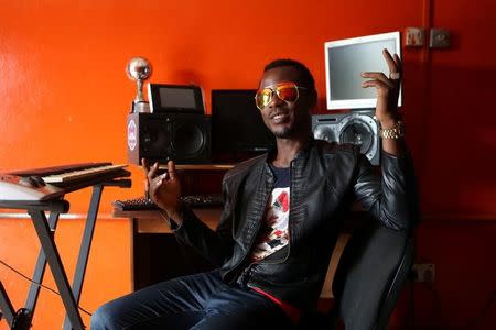 Music producer Keynote Adeosun poses for a picture in his recording studio in the Festac district of Lagos, Nigeria, May 17, 2016. REUTERS/Joe Penney