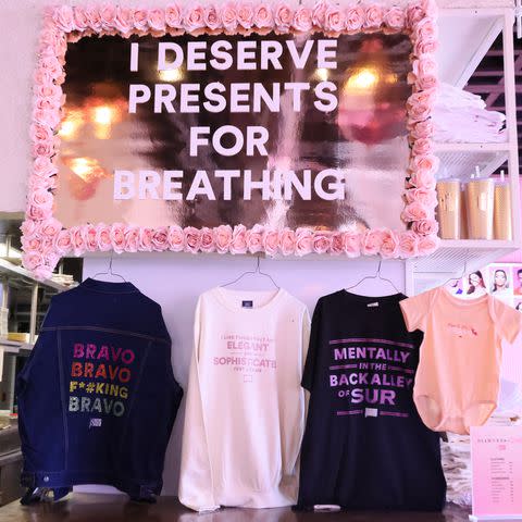 <p>Rodin Eckenroth/Getty</p> Bravo merch on display at Bravo's The Diamonds and Rose Experience