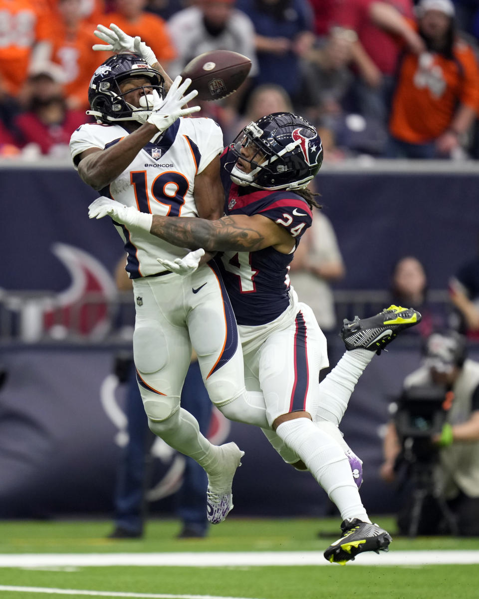 Houston Texans cornerback Derek Stingley Jr. (24) breaks up a pass intended for Denver Broncos wide receiver Marvin Mims Jr. (19) in the first half of an NFL football game Sunday, Dec. 3, 2023, in Houston. (AP Photo/Eric Christian Smith)