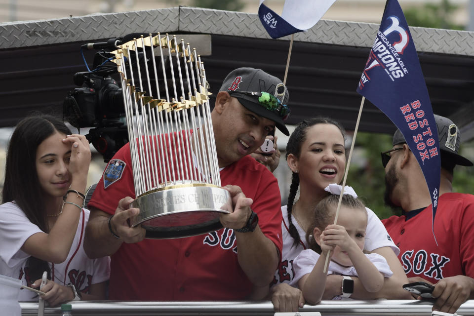 Boston Red Sox manager Alex Cora arrives at his puerto rican hometown with the 2018 World Series trophy, in Caguas, Puerto Rico, Saturday, Nov. 3, 2018. (AP Photo Carlos Giusti)