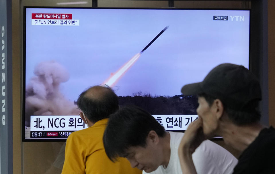 A TV screen shows a file image of North Korea's missile launch during a news program at the Seoul Railway Station in Seoul, South Korea, Tuesday, July 25, 2023. North Korea fired two short-range ballistic missiles into its eastern sea, South Korea's military said Tuesday, adding to a recent streak in weapons testing that is apparently in protest of the U.S. sending major naval assets to South Korea in a show of force. (AP Photo/Ahn Young-joon)