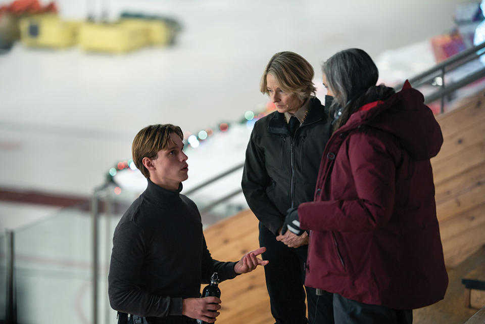 Supporting actor Finn Bennett, who plays Officer Peter Prior, taking direction from López before shooting a scene with Foster.