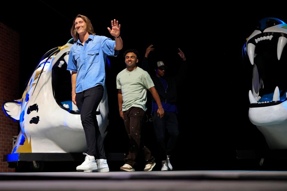 Jaguars quarterback Trevor Lawrence and wide receiver Christian Kirk wave to fans at the 2023 draft watch party at Daily's Place. The 2024 draft party will be Thursday, with gates opening at 7 p.m.