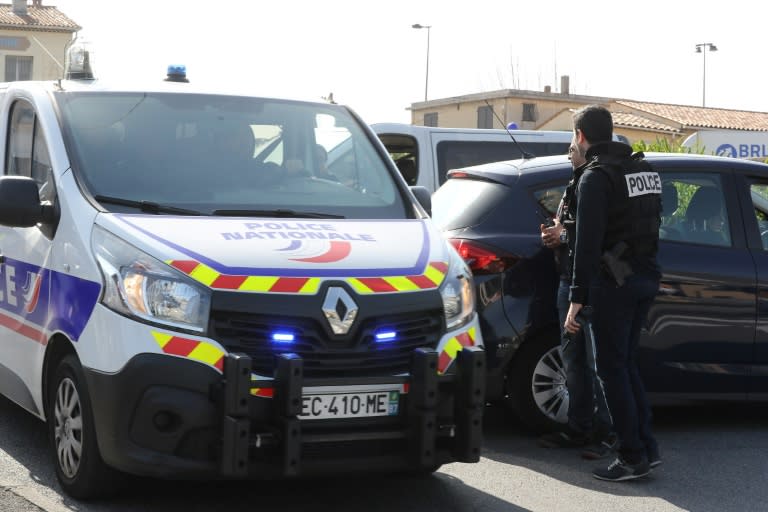 Police officers on duty in the southern French town of Grasse on March 16, 2017 following a shooting at the Tocqueville high school