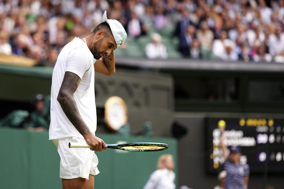 Australia's Nick Kyrgios prepares to serve to Brandon Nakashima of the US in a men's singles fourth round match on day eight of the Wimbledon tennis championships in London, Monday, July 4, 2022. (AP Photo/Alberto Pezzali)