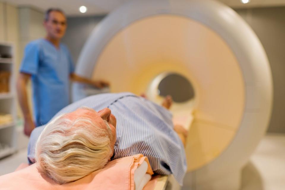 senior patient about to receive an mri scan