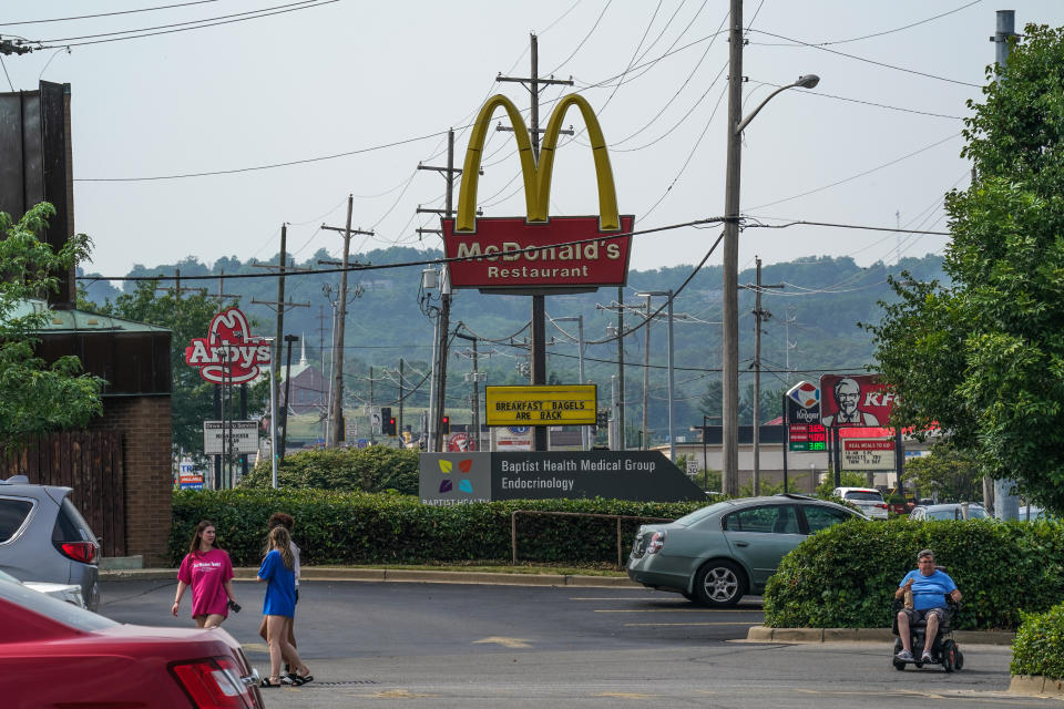 Fast-food restaurants dot a road near a hospital in New Albany, Ind. (Jahi Chikwendiu/The Washington Post)