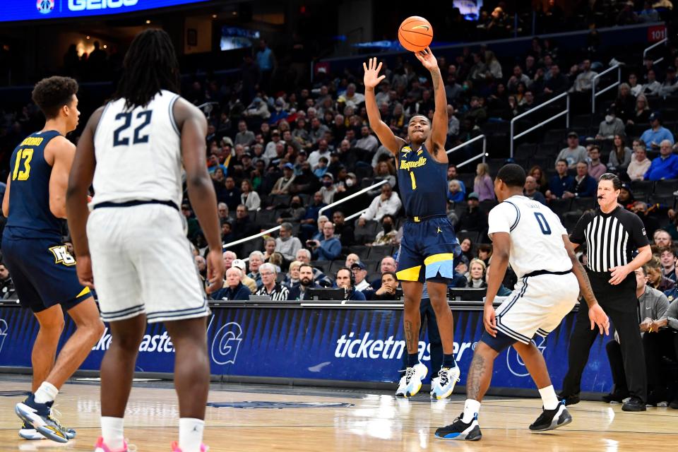 Marquette Golden Eagles guard Kam Jones shoots against the Georgetown Hoyas during the second half Saturday.