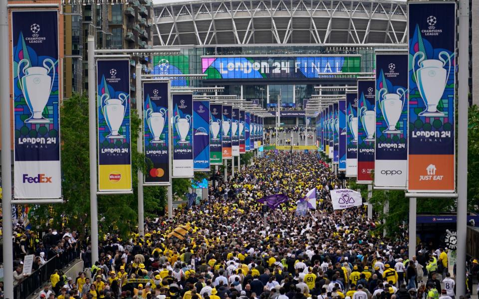 Fans arrive to Wembley Stadium/No booze but Lenny Kravitz and a blank canvas: Why Uefa likes Wembley for big-ticket events