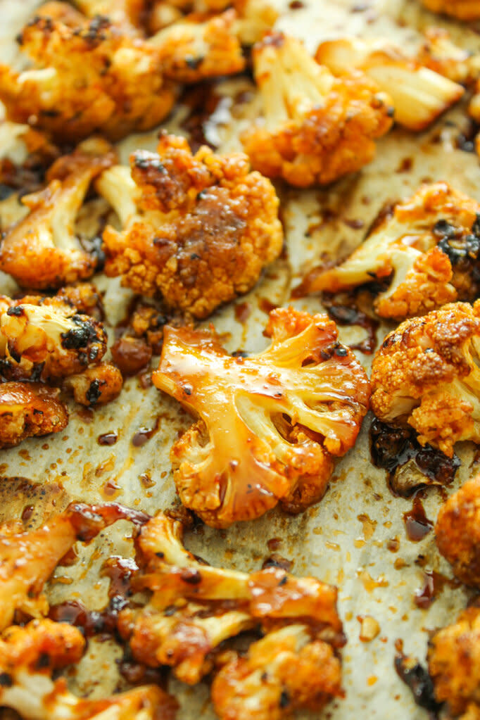 <strong><a href="https://thefitchen.com/sweet-spicy-baked-cauliflower/" target="_blank" rel="noopener noreferrer">Get the Sweet and Spicy Baked Cauliflower recipe from The Fitchen</a></strong>