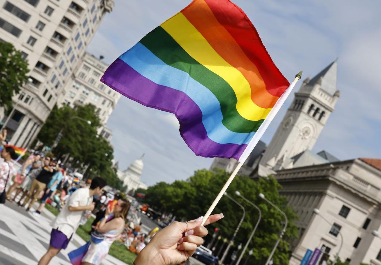 People gather to celebrate LGBTQ pride week in Washington, D.C. in June 2021. <a href="https://media.gettyimages.com/id/1323248787/photo/washington-dc-celebrates-pride-2021.jpg?s=1024x1024&w=gi&k=20&c=or_kRhEqEgdTtx_25mjBc7OpCq_B1pj8mGr88OAjY6Y=" rel="nofollow noopener" target="_blank" data-ylk="slk:Paul Morigi/Getty Images;elm:context_link;itc:0;sec:content-canvas" class="link ">Paul Morigi/Getty Images</a>