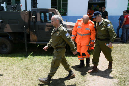 Israeli Colonel Golan Vach walks before Israeli military personnel help search for victims of a collapsed tailings dam owned by Brazilian mining company Vale SA,in Brumadinho, Brazil January 28, 2019. REUTERS/Washington Alves