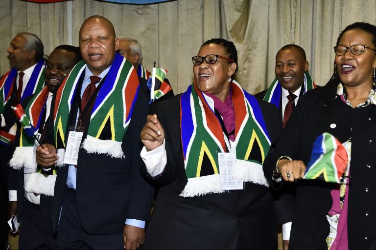 Delegates and guests celebrate after Durban was named as the host city for the 2022 Commonwealth Games during the official naming of the host city in Auckland on September 2, 2015