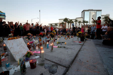 Stretch Sanders (R) of All Shades United speaks during a vigil marking the one-week anniversary of the October 1 mass shooting in Las Vegas, Nevada U.S. October 8, 2017. REUTERS/Las Vegas Sun/Steve Marcus