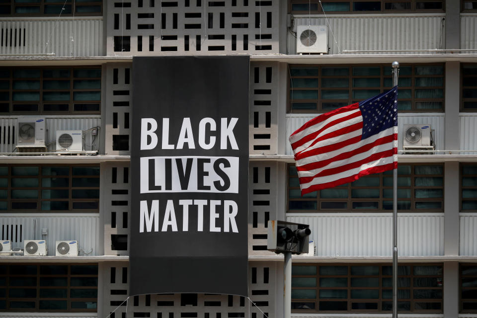 A huge Black Lives Matter banner is seen at the U.S. embassy in Seoul, South Korea, June 14, 2020.   REUTERS/Kim Hong-Ji     TPX IMAGES OF THE DAY