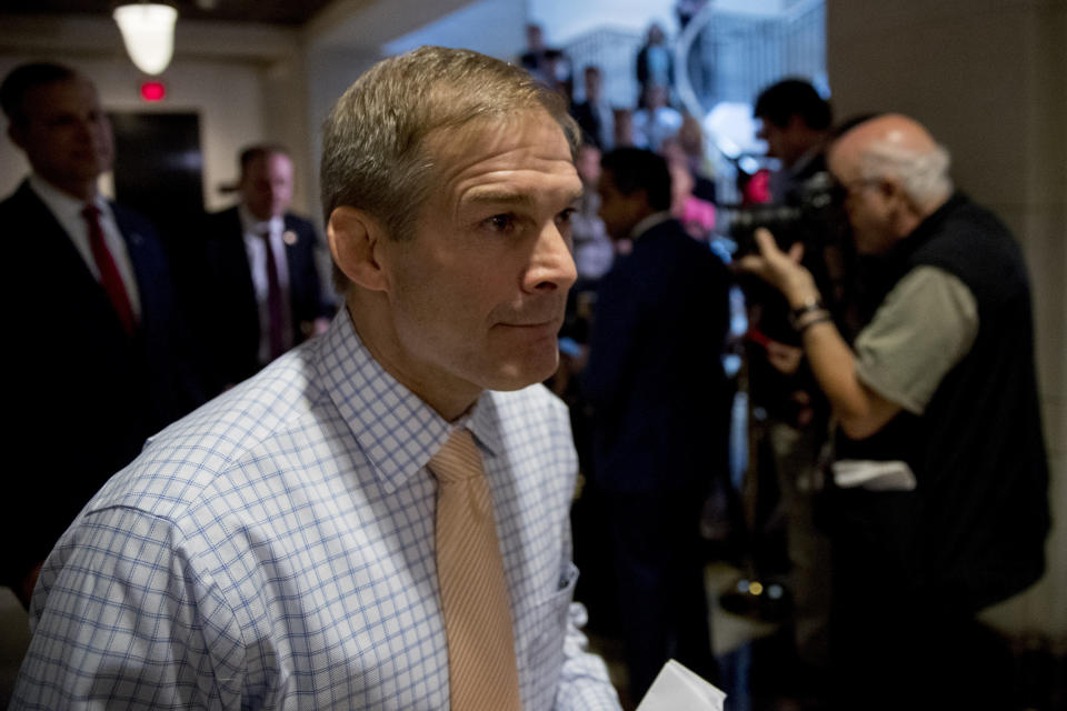 Republican lawmakers, from left, Rep. Scott Perry, R-Pa., Rep. Lee Zeldin R-N.Y., and Rep. Jim Jordan, R-Ohio, ranking member of the Committee on Oversight Reform, walk into a meeting after speaking to reporters where former White House advisor on Russia, Fiona Hill, will testify before congressional lawmakers as part of the House impeachment inquiry into President Donald Trump, on Capitol Hill in Washington, Monday, Oct. 14, 2019. (AP Photo/Andrew Harnik)