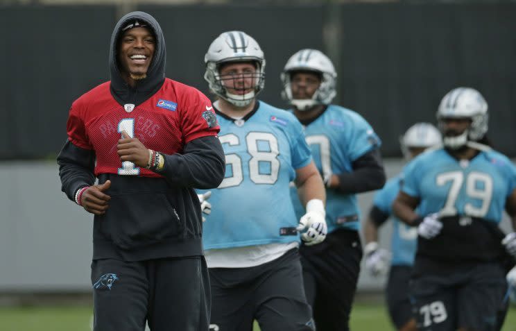 Panthers QB Cam Newton is recovering from shoulder surgery he had in March. (AP) 